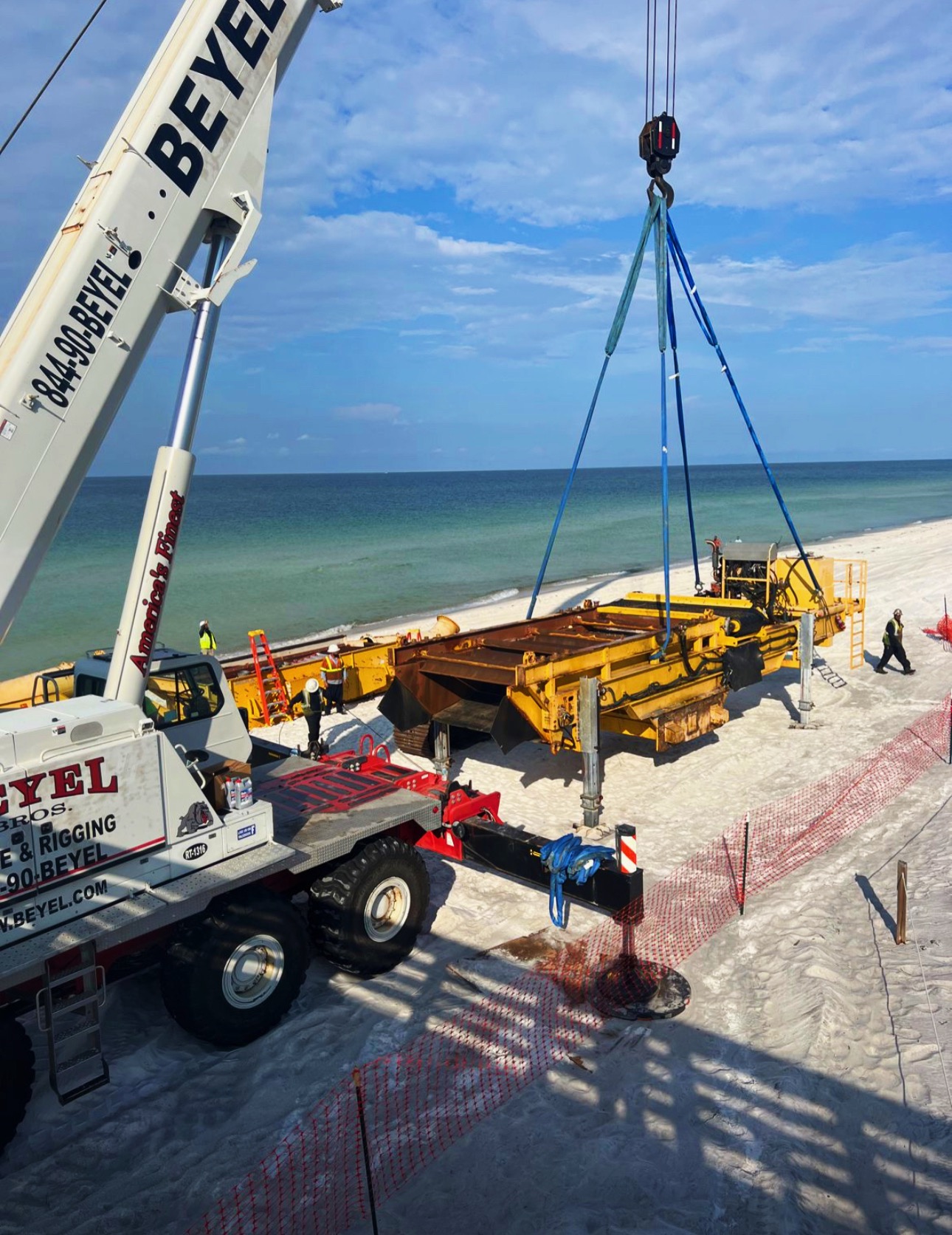 Beyel Brothers installing a pedestrian bridge at night in Clearwater, Florida